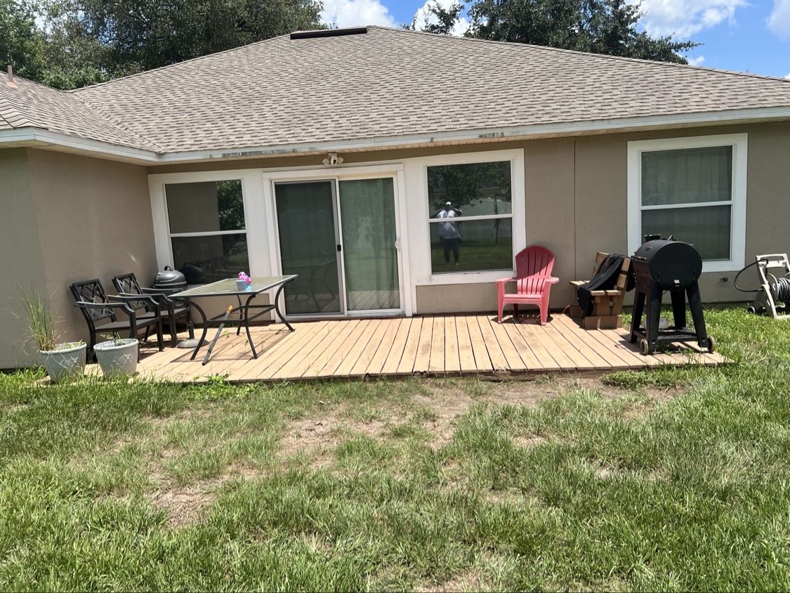 Full view of the old wooden deck before removal