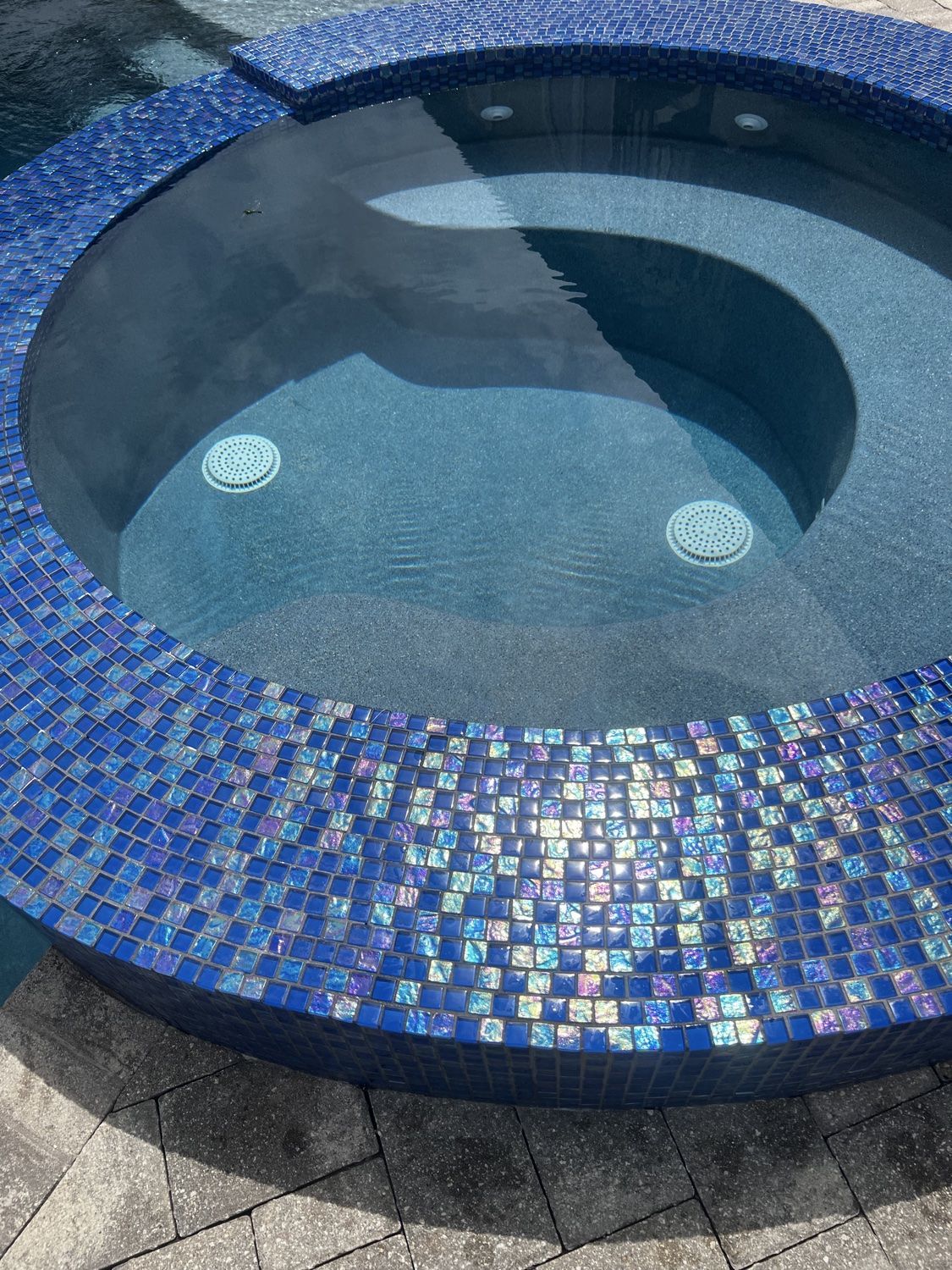 A sparkling clean pool serviced by Pelican Pool and Patio