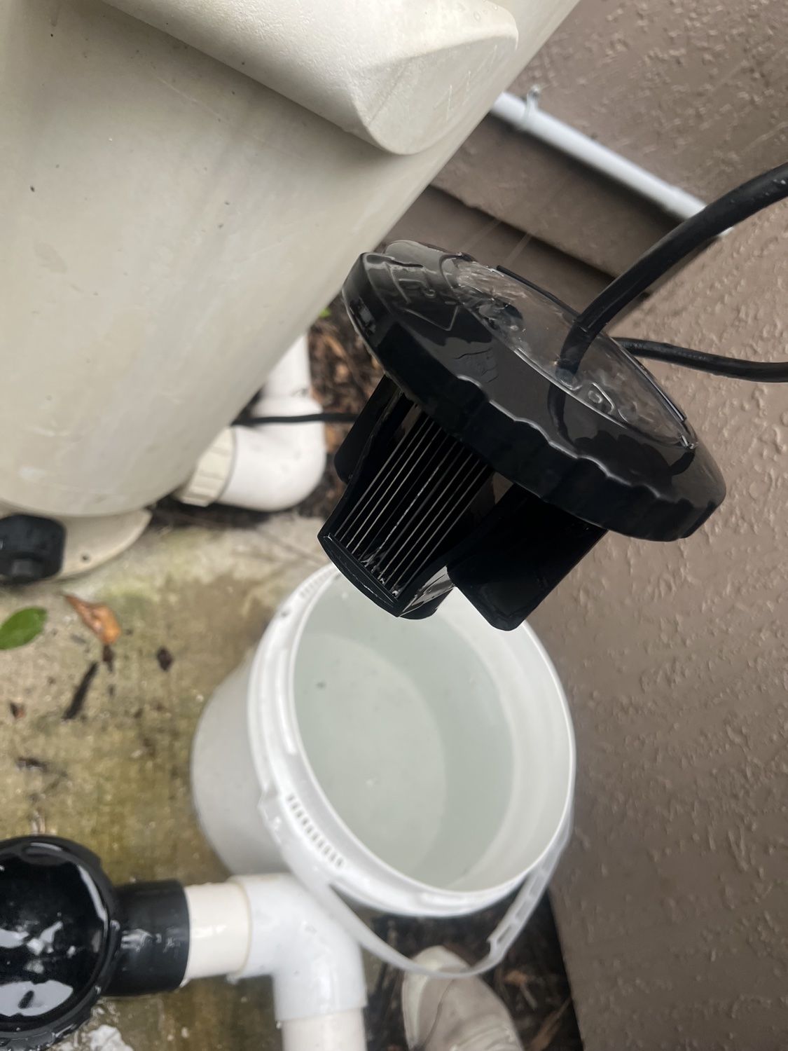 Salt chlorine generator cell after cleaning with scale removed from the plates